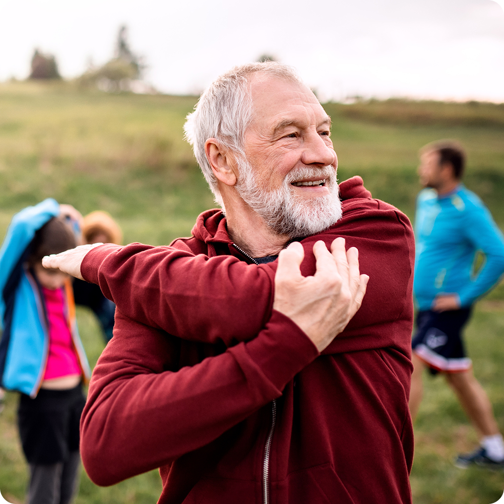 Senior exercising outdoors